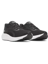 Championes de running Under Armour modelo W Ascend, color negro con entresuela blanca. Presentan una parte superior de malla liviana y transpirable con tecnología Charged Cushioning para mayor amortiguación y respuesta.