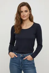 Remera blanca de manga larga, de algodón y elastano, corte ajustado y cuello redondo.