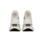 Championes Converse Chuck Taylor All Star de caña alta, color blanco hueso, con suela de goma con plataforma y logo de la marca en el lateral.