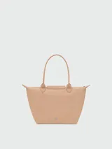 Bolso tote Longchamp modelo Le Pliage One en tamaño mediano, color bordó, con diseño minimalista, cierre superior y doble asa de mano.
