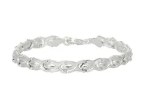 Pulsera de plata 925 con eslabones ovalados y detalles en forma de hoja. Cierre de mosquetón.