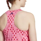 Musculosa deportiva Adidas color rosa con estampado de rombos rojos.