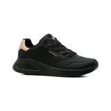 Championes Skechers modelo Uno Lite Shimmer Along, color negro con detalles metalizados en tono oro rosado en el talón y el logotipo lateral. Cuentan con capellada de durabuck sintético con perforaciones sutiles, cordones negros y entresuela de plataforma.