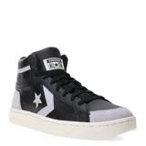 Championes de caña media Converse Pro Blaze Classic Mid, color negro con detalles en gris y blanco. Presentan el logo de la marca en el lateral y están confeccionados en cuero sintético.