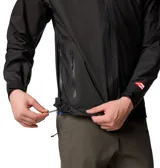 Campera impermeable Columbia modelo Reign No Shine Jkt Outdry, de color negro con capucha ajustable y cierre frontal con cremallera. Presenta un acabado mate, costuras selladas visibles en contraste gris y tecnología OutDry Extreme para mayor protección contra la lluvia.