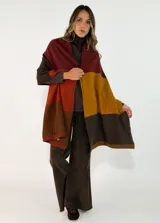 Pashmina de tejido de punto con diseño de bloques de color en tonos grises, con terminaciones acanaladas en los extremos.