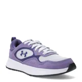 Championes deportivos Under Armour modelo Mirage Sport, con diseño en tonos violeta y blanco. Presentan una combinación de malla y gamuza, con el logo de la marca en el lateral y una suela blanca con base negra.