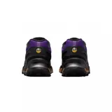 Championes Nike Air Max Dn8 de diseño moderno y deportivo. Presentan una combinación de colores en negro y violeta, con una suela técnica que incorpora cápsulas de aire visibles en tono bronce para mayor amortiguación.