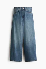 Jean wide leg de tiro alto en denim rígido de mezcla de algodón y lyocell, en color azul, con diseño de cinco bolsillos y corte holgado en las piernas.