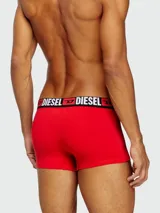 Boxer de algodón negro con cintura elástica ancha que presenta el logo de la marca Diesel en letras blancas y rojas.