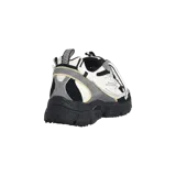 Championes Off-White Be Right Back, modelo con diseño chunky y estilo técnico, combinando paneles en blanco, negro y gris con detalles característicos de la marca como la brida adjunta y la suela con inscripción.