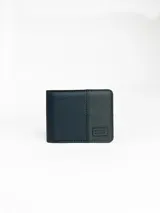 Billetera negra marca Rusty, modelo Lastin, con logo de la marca en la parte frontal.