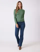 Buzo de tejido acanalado, con cuello redondo y mangas largas, de calce ajustado al cuerpo.