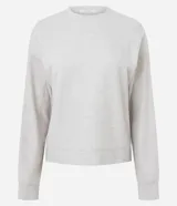 Blusa básica de manga larga con cuello redondo y puños ajustados, confeccionada en tejido de algodón y poliéster. Presenta un corte regular anatómico y diseño liso sin estampas.