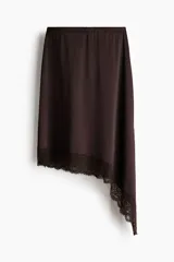Pollera midi color marrón oscuro de punto, con cintura elástica y diseño asimétrico en el bajo adornado con detalle de encaje.