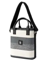 Matera modelo Cadiz con diseño a rayas en tonos beige, blanco y marrón, asas cortas de mano y correa larga ajustable para el hombro.