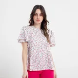 Blusa estampada con cuello redondo y mangas cortas con volados.