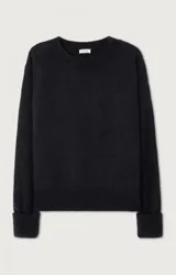 Sweater de punto de corte amplio y textura mullida, con cuello redondo y mangas largas con puños acanalados. Confeccionado en una mezcla de lana y alpaca de alta calidad.