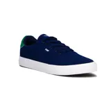 Championes urbanos Pony Champion Casual Canvas, color azul marino con detalles en verde en el talón, suela blanca y logo de la marca en el lateral.