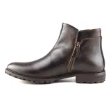 Bota corta de cuero color marrón oscuro, con cierre lateral y suela de goma.