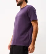 Remera deportiva de hombre Get Over con tecnología dry, cuello redondo y mangas cortas, confeccionada en mezcla de modal, poliéster y elastano.