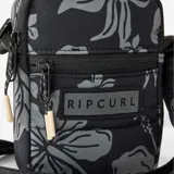 Bolso bandolera Rip Curl Weekend Travel Crossbody, color negro con estampado de flores grises y logo de la marca en el frente.