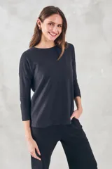 Sweater blanco de algodón y poliéster, de corte holgado y manga 3/4.