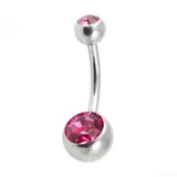 Piercing de ombligo de acero quirúrgico con una esfera superior y una esfera inferior con un cristal incrustado.