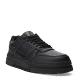 Championes urbanos de estilo clásico, color negro, con diseño de paneles, perforaciones en la puntera y suela de plataforma plana.
