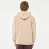 Buzo de chándal con capucha color beige, con cordones ajustables, bolsillo canguro frontal y puños y dobladillo acanalados.