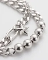 Pulsera de plata italiana 925, compuesta por una cadena de eslabones finos y una sección de esferas metálicas, con un dije colgante en forma de estrella.