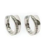 Par de aros tipo argolla de plata 925 con incrustaciones de circonias.