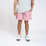 Short de baño azul marino de nylon con cintura elástica y logo de la marca en la pierna.