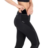 Calza larga de running New Balance Impact Run Tight, color negro, con cintura alta, bolsillos laterales y trasero con cierre, tecnología NB DRYx de secado rápido y detalles reflectantes.