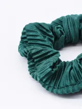 Coletero de pelo verde esmeralda con textura acanalada.