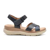 Sandalias con plataforma de Korium, color azul marino, con ajuste de velcro en el tobillo y tiras cruzadas en el empeine.