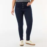 Pantalón de jean tipo skinny, color azul oscuro, con tiro muy alto y cierre frontal de botones expuestos.