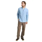 Camisa de manga larga Roark modelo Scholar, color celeste, confeccionada en algodón orgánico. Cuenta con cuello abotonado, cierre frontal de botones, bolsillo aplicado en el pecho con detalle de etiqueta de la marca y mangas largas con puños abotonados.