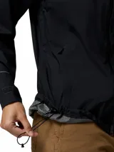 Campera cortaviento impermeable y transpirable Columbia Trailborne 2.5L de color negro, con capucha integrada, cierre frontal bidireccional y bolsillos con cierre.