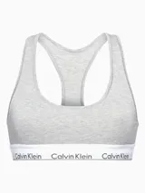 Bralette deportivo Calvin Klein Modern Cotton, color gris, sin relleno ni forro, con espalda cruzada y banda inferior elástica blanca con logo de la marca.
