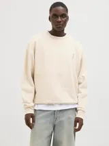 Buzo color crema de algodón con cuello redondo, manga larga y puños acanalados. Estampa en la espalda con la palabra "POISONOUS" y un diseño floral.