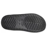 Sandalias tipo mule negras con plataforma, forradas con material afelpado negro en las tiras y el interior. Presentan dos tiras ajustables con hebillas y orificios para dijes Jibbitz™.