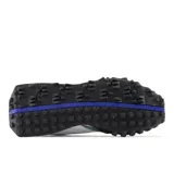 Championes New Balance modelo XC72, color verde oliva con detalles en blanco y negro.