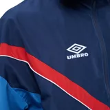 Campera deportiva Umbro del Club Nacional de Football, modelo Beat. Diseño con cierre frontal, cuello alto y bloques de color en azul marino, celeste, rojo y blanco, con el escudo del club y el logo de Umbro bordados en el pecho.