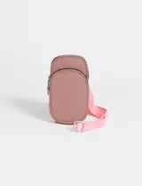 Riñonera porta celular color rosa con correa larga regulable.