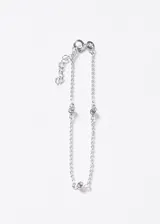 Pulsera de plata 925 de cadena eslabonada con tres zirconias engastadas a lo largo del diseño.