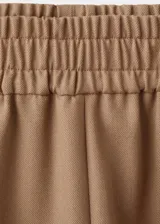 Pantalón de lana de tiro alto, diseño recto y largo, con cintura elástica con cordón y bolsillos laterales.