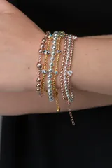 Pulsera de plata 925 con baño de oro rosa, compuesta por esferas pequeñas.