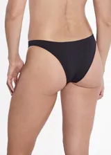 Bombacha tipo vedetina confeccionada en microfibra sin costuras, con refuerzo interior de algodón.