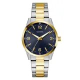 Reloj analógico Guess Easton con caja de 40mm y malla de acero inoxidable bicolor en tonos plateado y dorado. Presenta una esfera azul con acabado sunray, índices y números dorados, y movimiento de cuarzo.